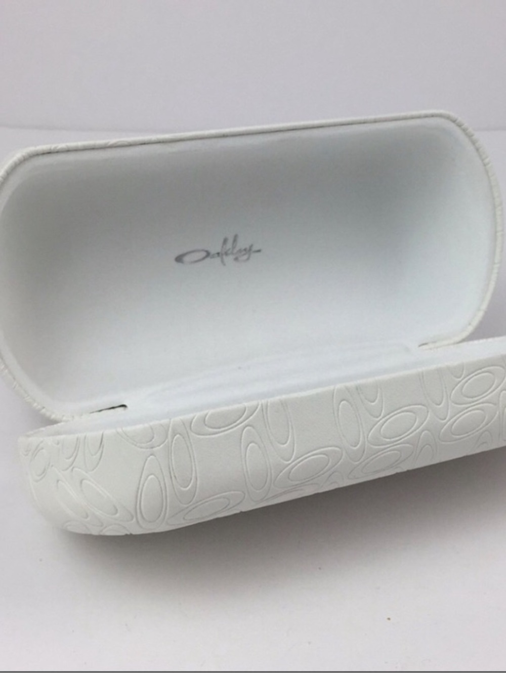 Oakley women's white Embossed faux leather hard clamshell case